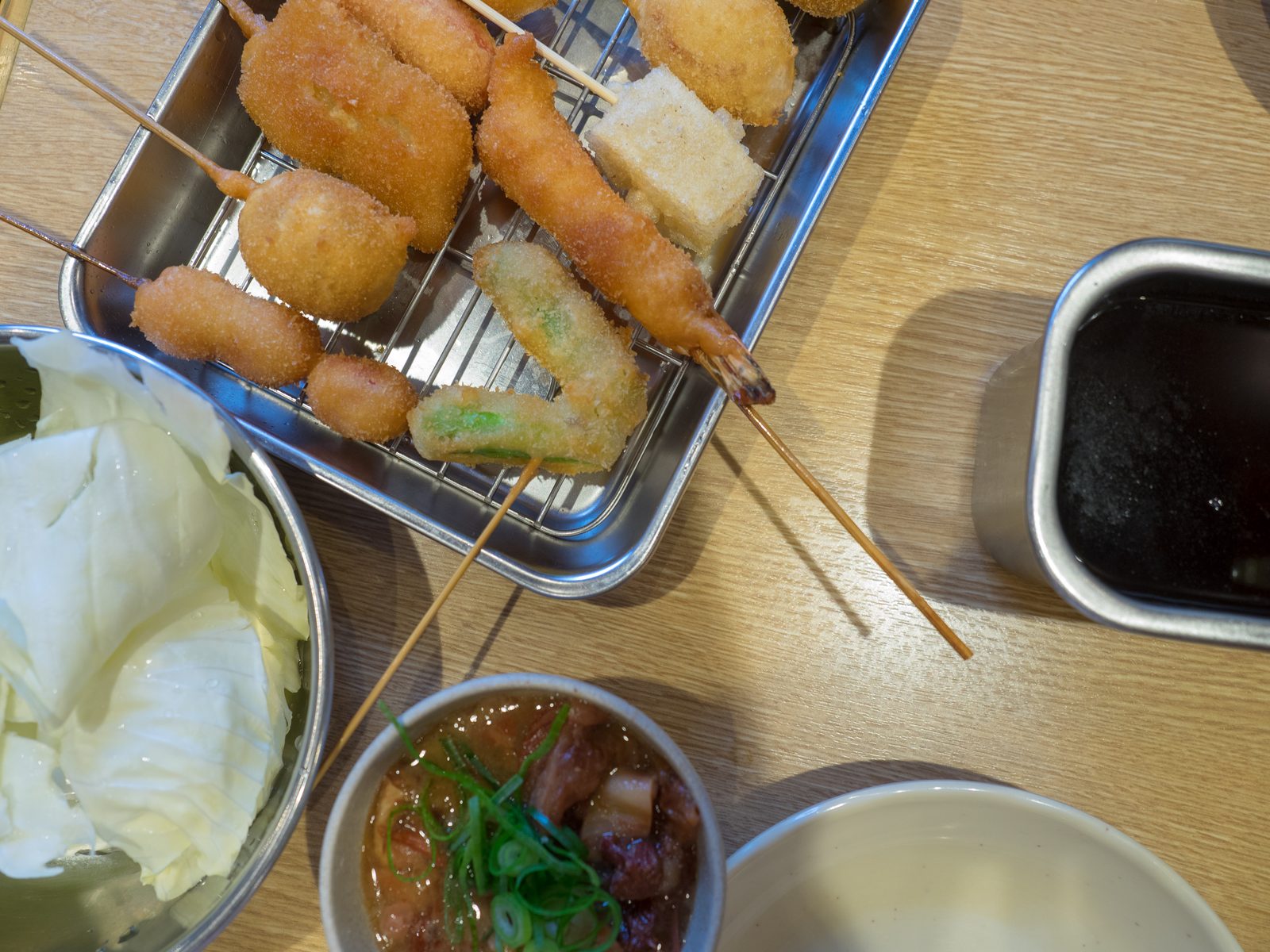 Kushikatsu skewers with the shared dipping sauce